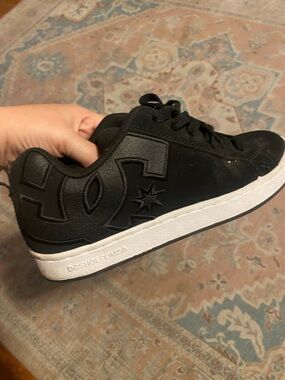 DC Black Low-Top Skate Sneakers with women’s size 7.5